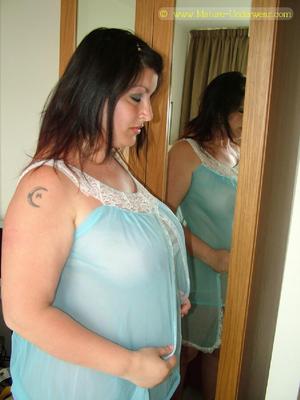 . Christiana. Big woman in negligee